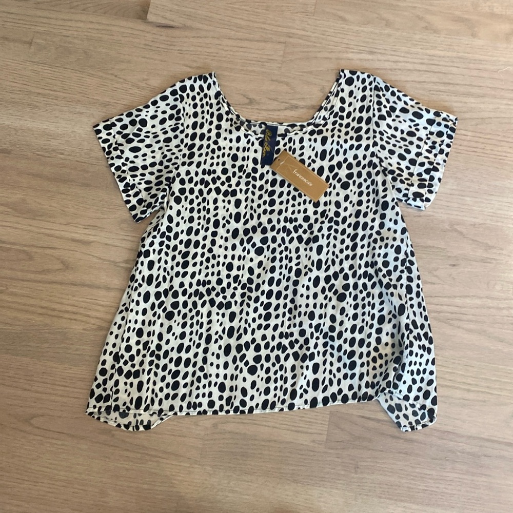Francesca’s light and airy top with an open slit back!